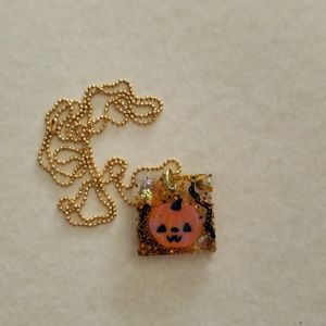 Resin cast pendant with ball chain